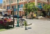 محل للبيع في الشيخ زايد بمول المعز 64م مؤجر لبراند بعائد 30 ألف