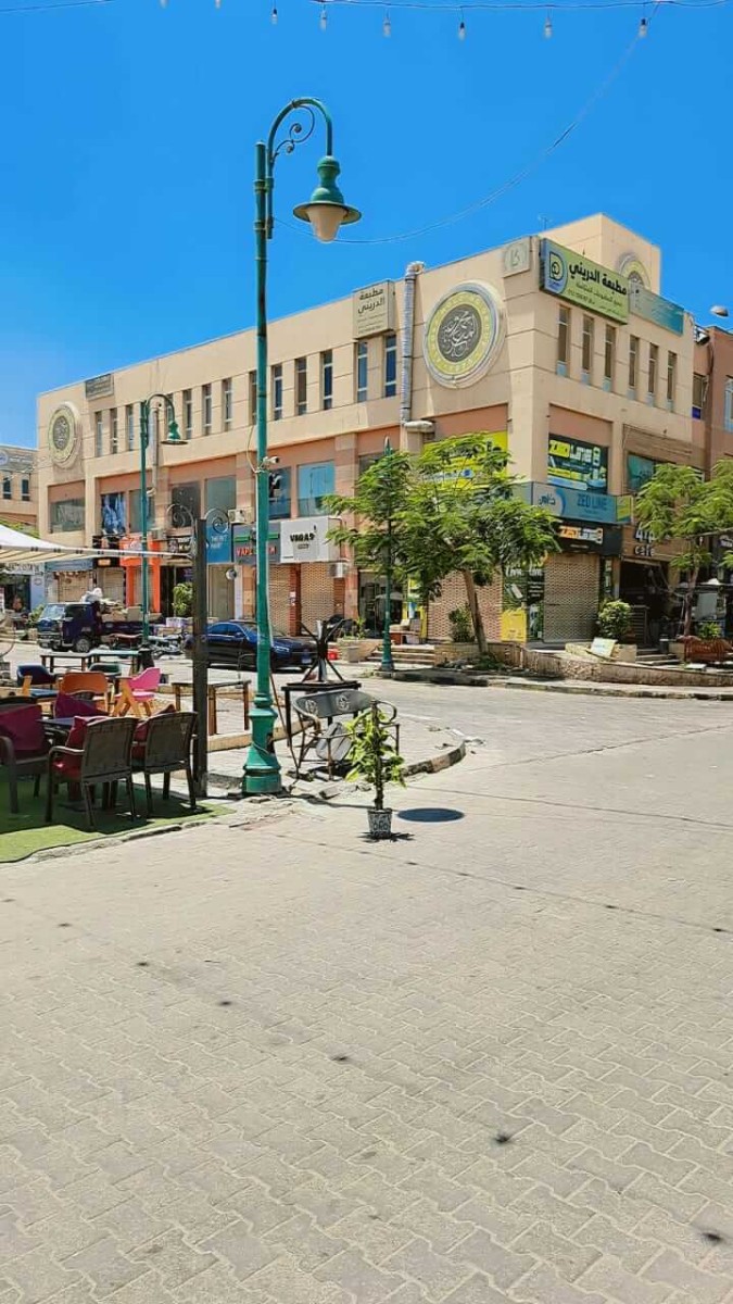محل للبيع في الشيخ زايد بمول المعز 64م مؤجر لبراند بعائد 30 ألف